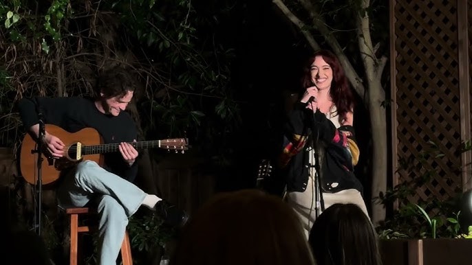 Olivia O’Brien performing at Sofar Sounds with a guitarist